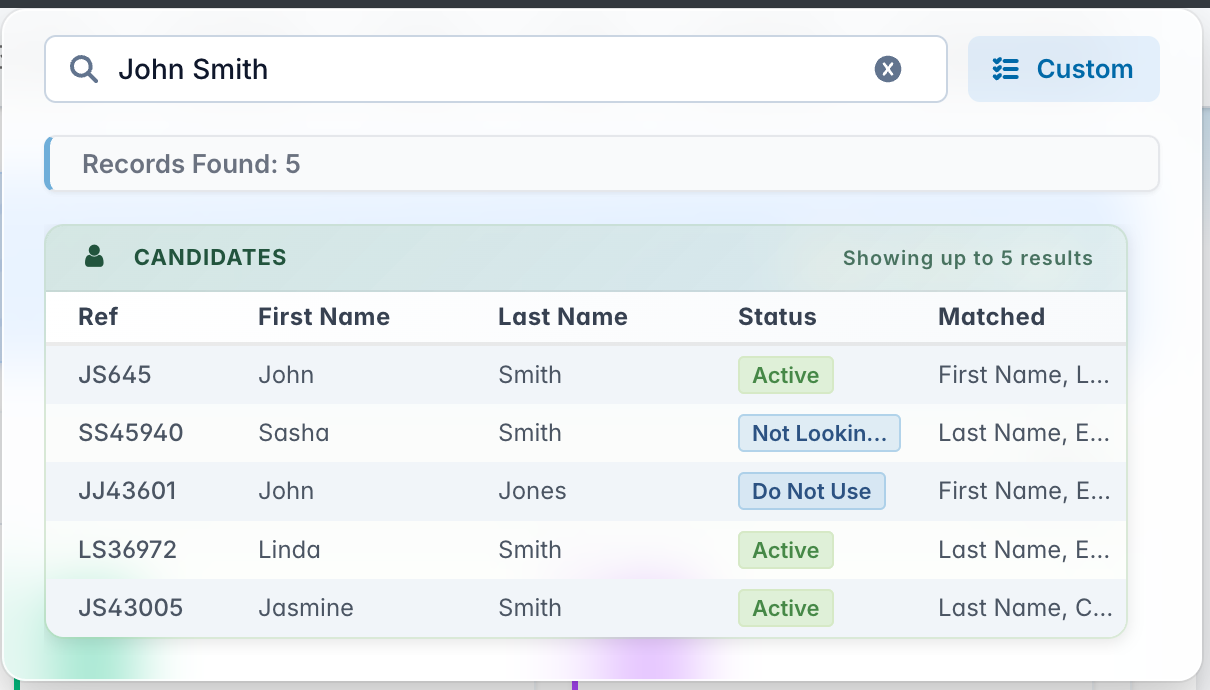 Global search panel showing John Smith candidate results